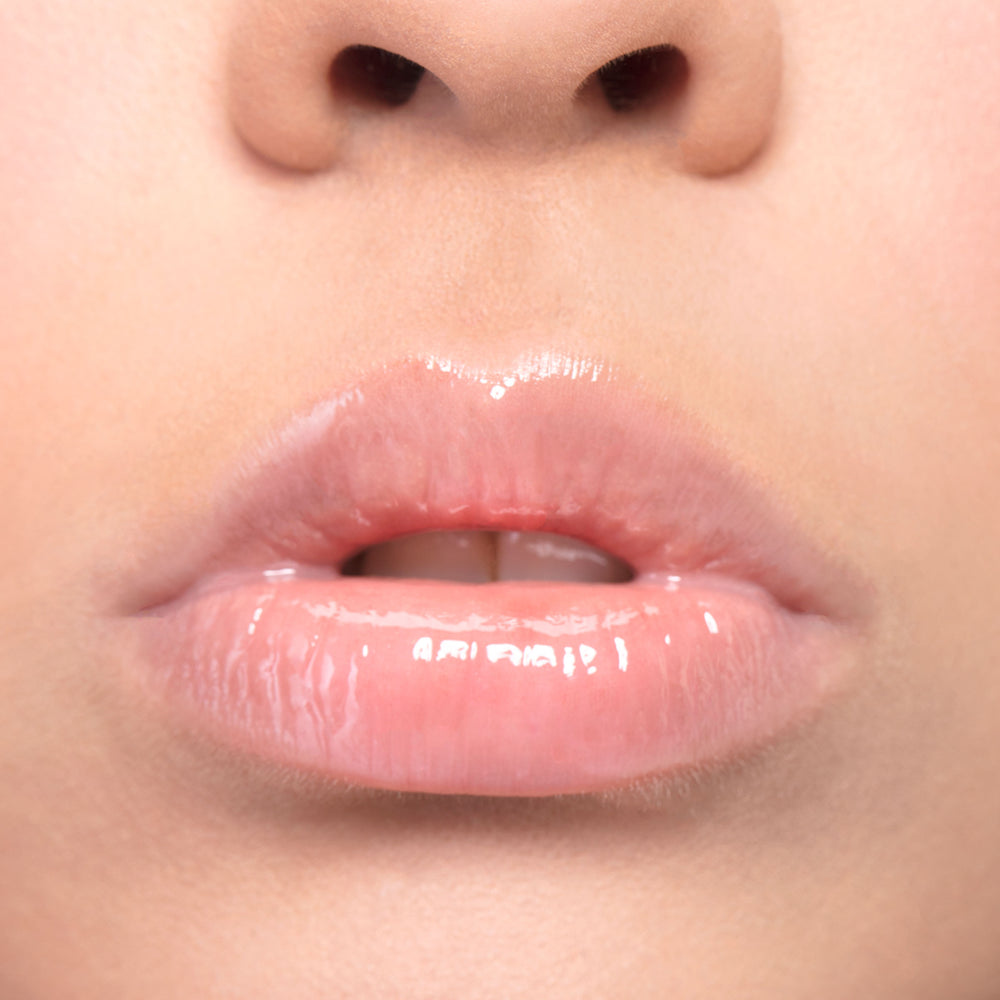 Close up of Model wearing Glossay high shine lip gloss